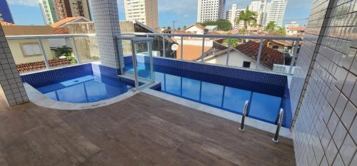 สระว่ายน้ำ, Excelente Apto com piscina 200 mts da praia - QX10H in มารากานา