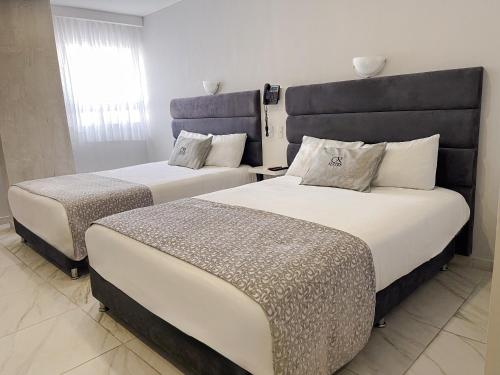 Deluxe Double Room with Two Double Beds image 3