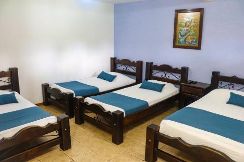 1 double bed, 3 twin beds