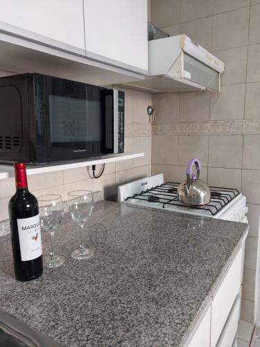 Kitchen, Patagonia Relax- Depto zona centrica y de servicios de salud in Comodoro Rivadavia