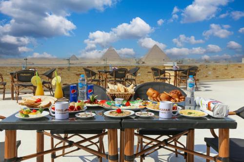 Tweepersoonskamer, familie, uitzicht op de piramide
