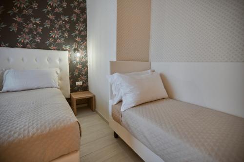 Deluxe Triple Room room in Castrichella Smart Boutique Hotel Rome Airport