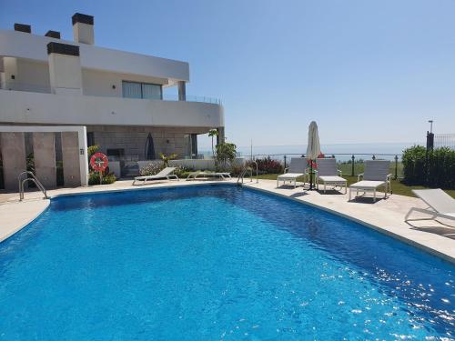 Luxury beachfront apartment with pool, sauna, fitness and gym in province Malaga, Andalusia