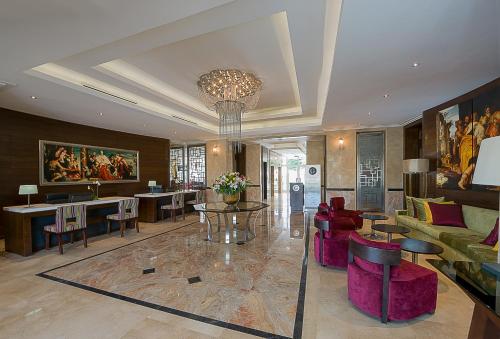 Shared lounge/TV area, The George Hotel in Ikoyi