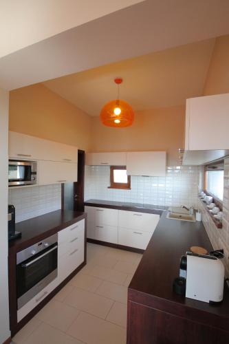 Kitchen, August Panorama Apartman in Vac