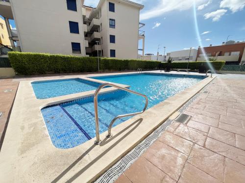 Global Vacacional, Piso práctico, con terraza y piscina en la playa de Canet, Canet de Berenguer (fotografie 3)