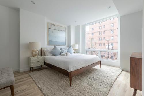 Sun-kissed 3BR Loft with Patio Minutes to NYC in Hoboken, USA
