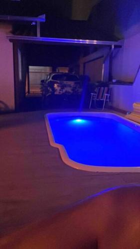 Casa com piscina em Itapema próximo a praia