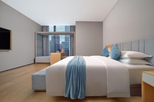 Deluxe Double Room room in Pagoda Design Hotel Hangzhou Binjiang CBD