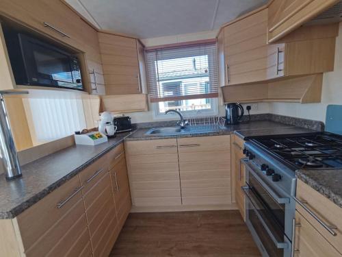 Konyha, Sea and Mountain view Sunbeach Holiday Snowdonia in Llwyngwril