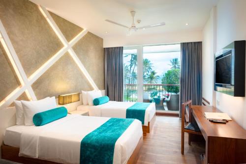 Camelot Beach Hotel Room Type - Coastal Deluxe Balcony Twin