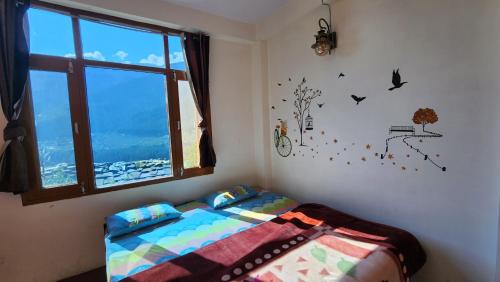 Safarnama Stays Manali - Rooms with Snow Peaked Mountain View