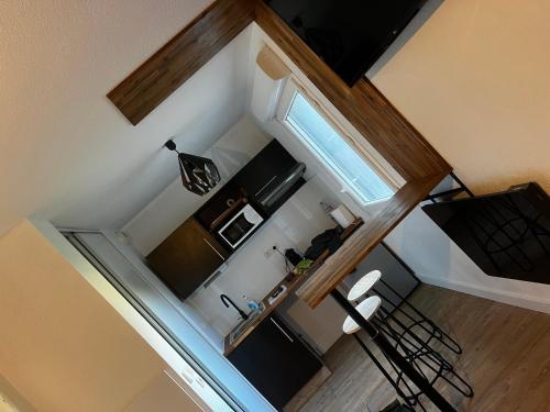 Kitchen, Secrete loft, spa & jaccuzi privatif - parking & bien-etre pres de Toulouse in Saint-Alban