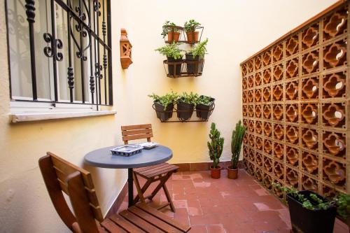 WISH SUITE TORRES DE SEVILLA - Tap to explore photos