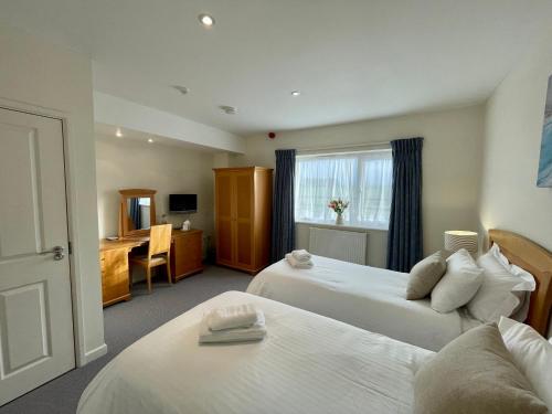 Cosy room with golf & the beach on your doorstep!