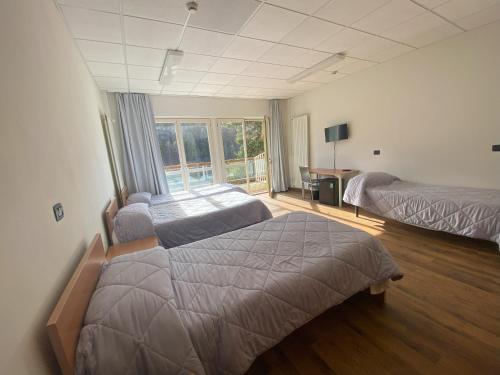 Villaggio Olimpico Room Type - Quadruple Room Villaggio Olimpico Room Type - Quadruple Room