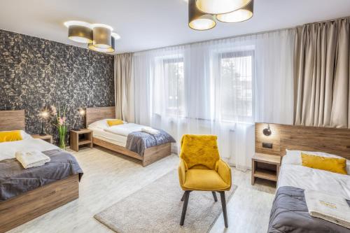 Hotel Beta Room Type - Deluxe Triple Room