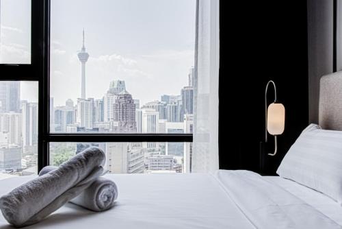 Axon Residence at Pavilion KLCC KL Tower view by KIMIRO Axon Residence at Pavilion KLCC KL Tower view by KIMIRO