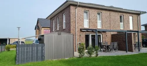 NEU!Moderne, lichtdurchflutete DHH, zentral, Garten, Wallbox, WLAN in Butjadingen, Deutschland