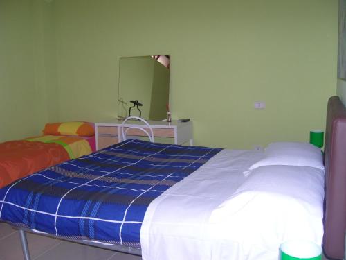 Quadruple Room with Private Bathroom