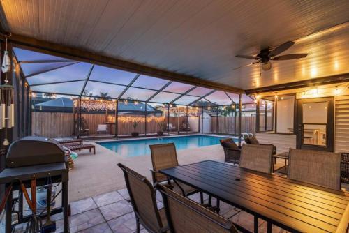 Heated Pool,Game Room,Fire Pit,Outdoor Kitchen and Movie theather