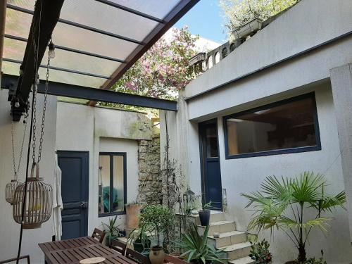 Loft en duplex 270 m2 & Jardin patio terrasse sauna