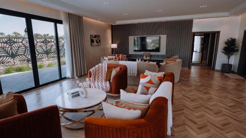 Shared lounge/TV area, Hatta valley Farmstay & activities & families in Hatta