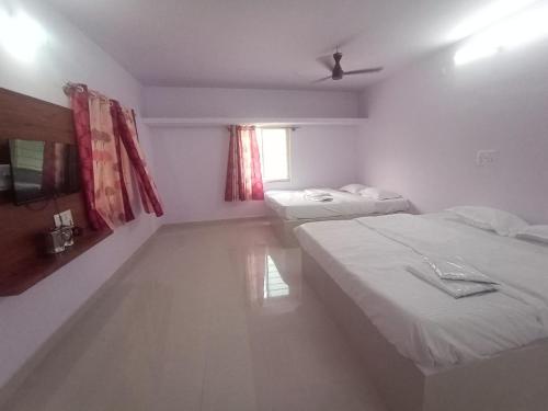 Sarathi Rooms