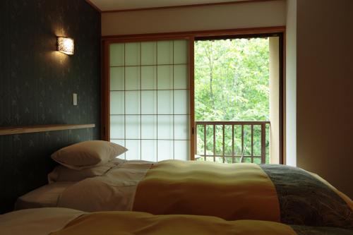 Room with Tatami Area and Shared Bathroom