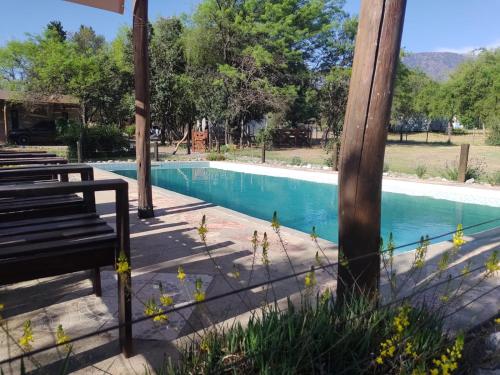 Peldbaseins, Cielos Abiertos in Loma Bola