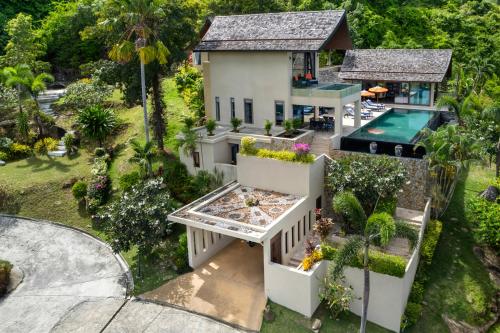 Villa Tiga - Cliffside Seaview Oasis - Tap to explore photos