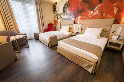 Foto 1: First Inn Hotel Zwickau