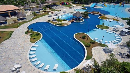 Iloa Residence Apt Premium -Quarto e sala climatizado - Poxim