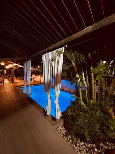 Swimming pool, Pousada Le Baron in Praia Do Frances