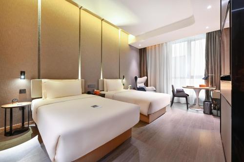 Jimu Twin Room with Inner Window room in Atour Hotel Tianjin Eye