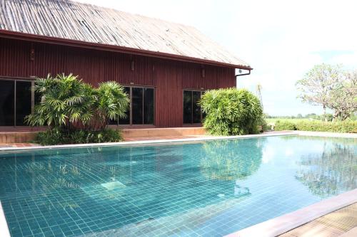 บ้านไทยรีสอร์ท in Si Prachan