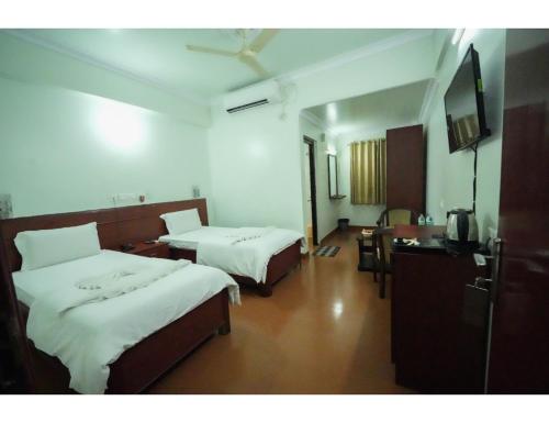 客室内ベッド, Hotel Ocean Inn, Paradeep, Odisha in パラディープ