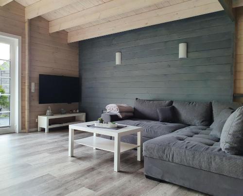 Idyllisches-Blockbohlenhaus-mit-eigenem-Garten-und-Sauna-zum-Wohlfuehlen in Rastorf