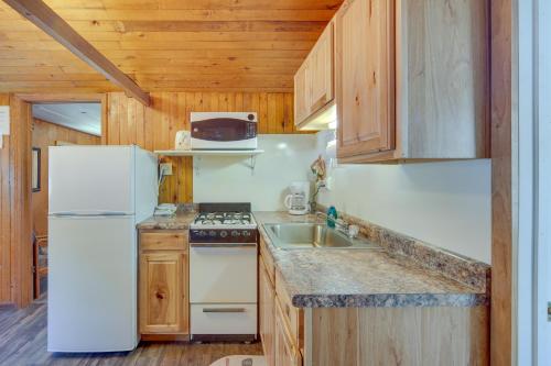 Rustic Cabin with Fire Pit, Steps to Sand Lake!