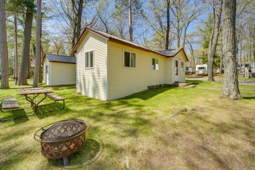 Rustic Cabin with Fire Pit, Steps to Sand Lake!