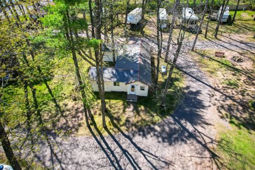 Rustic Cabin with Fire Pit, Steps to Sand Lake!