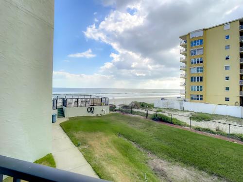 Ocean View with a beachfront pool at Ocean Trillium Condo ~ 203 in New Smyrna Beach, USA