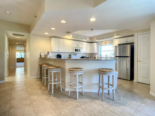 Gorgeous Ocean Walk Corner Unit with Water Views OW15-207 in New Smyrna Beach, USA