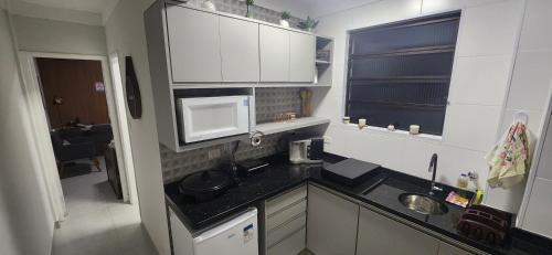 Lindo Apartamento compacto na quadra da praia - Porto Macuco