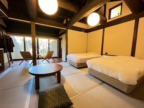 Standard Quadruple Room with Open-Air Bath