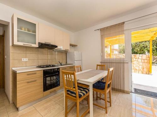 virtuve, Apartments Cikac II - modern apartments by the beach in Kolan