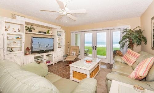 Book Now Walk right out to the Beach Oceanfront Ground Floor Condo - Southwind 104 in New Smyrna Beach, USA