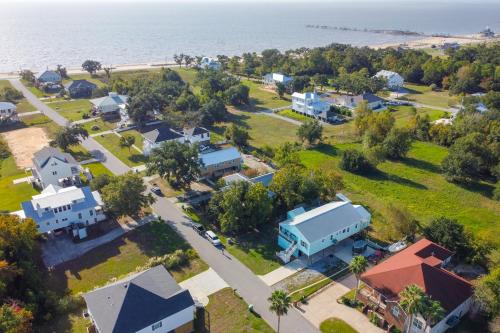 Sunny Waveland Home Rental with Pool Walk to Beach!