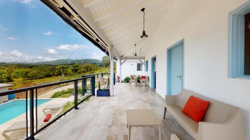 ระเบียง/ชานเรือน, Les Maisons Cane 3 Maisons Vue Panoramique, Piscine & Jardin Tropical in ซานต์ โรเซ