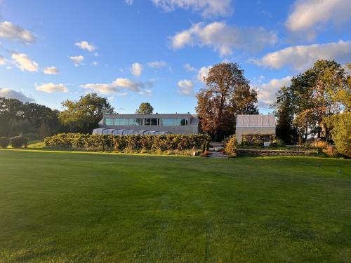 Vista Exterior, LedowoHouse Industrial own golf course, kids friendly in Bystra